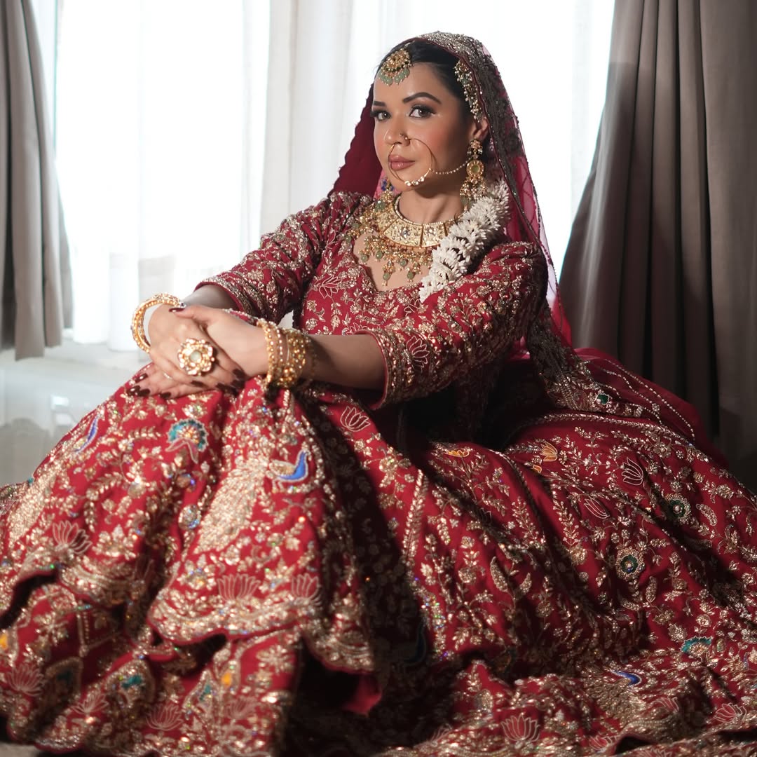 Full lehenga seated bridal portrait